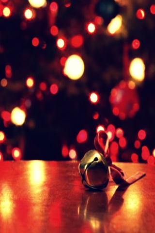 圣诞节气氛里的蜡烛和霓虹灯光iPhone壁纸下载320x480