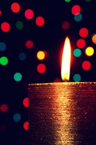 圣诞节气氛里的蜡烛和霓虹灯光iPhone壁纸下载320x480